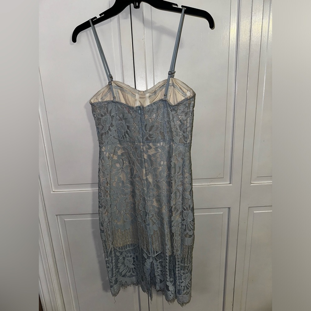 A. Peach dress. Cream slip with light blue floral pattern over